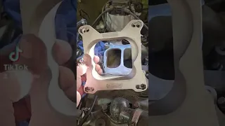 adapting an carburetor to a quadrajet intake. everyone gets this wrong .it is so simple to upgrade