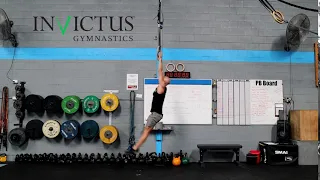 High Elbow Kipping Pull-Up on Rings Demo | CrossFit Invictus Gymnastics