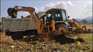 Loading mud on Tata 1618 4x4 tipper by JCB Excavator