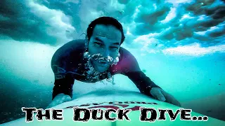 Duck diving feels almost as good as surfing.