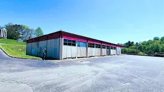 EXPLORING ABANDONED KMART CAR SHOP *WE GOT INSIDE*