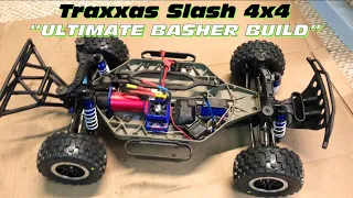 Traxxas Slash 4x4 “ULTIMATE BASHER BUILD” // UPGRADES // SHOCKS & TIRES!