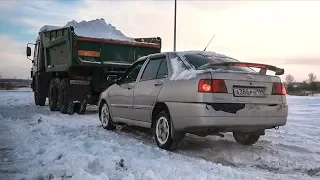 Old Chinese Chery drives under Kamaz at speed