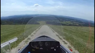Sailplane does a gravity take off from top of a hill