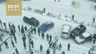 Footage: 9 vehicles in domino-style pile-up on icy road