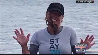 Woman puts octopus on her face