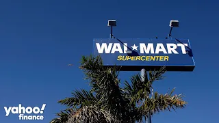 Walmart lays off hundreds of corporate workers and cuts forecast
