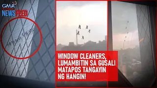 Window cleaners, lumambitin sa gusali matapos tangayin ng hangin! | GMA Integrated Newsfeed