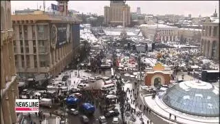 Ukrainian police move against protesters as Tuesday deadline approaches