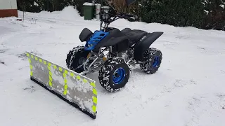 Quad 150cc custom exhaust and snow plow