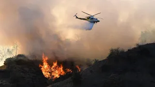 California Wildfires Burn Just Miles From Community Grieving Over Shooting