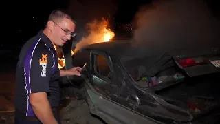 FedEx driver rescues man from burning car crash