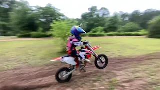 Roman practicing his wheelies on his new KTM 50 SX.