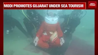 PM Modi Promotes Gujarat's Undersea Tourism with Historic Scuba Dive