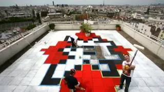 space invader street artist rooftop