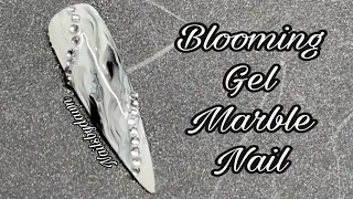 Blooming gel marble nail design