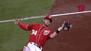 COL@WSH: Harper slides to snag a foul ball in right