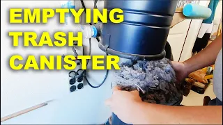 EMPTYING CENTRAL VACUUM TRASH CANISTER