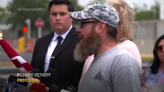 Protesters outside George Santos court appearance