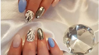 Sculpted almond gel nails. Gel extensions on forms. Mirror chrome nail art and marble. Almond nails