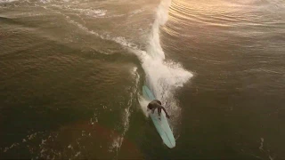 Surfing Santa in Narragansett, Rhode Island