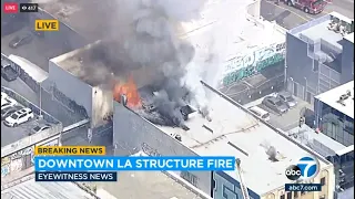 Firefighters battling large structure fire in downtown Los Angeles