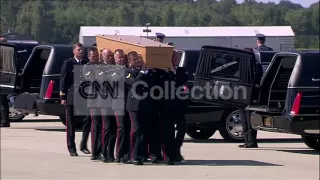 MH17:COFFINS REMOVED FROM PLANE (LONG)