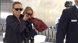 Vanessa Paradis and Lily-Rose Depp Sneak Through LAX