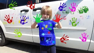 Фёдор украшает машину в яркие цвета/Fedor decorates the car in bright colors