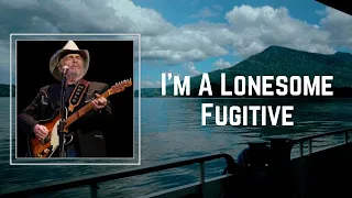 Merle Haggard - I m a Lonesome Fugitive (Lyrics)