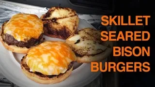 Skillet Seared Butter Bison Burgers with cheese and onion. Thick, juicy, cheesy and delicious.