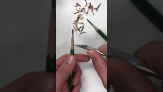 Sharpening a pencil with an Xacto knife