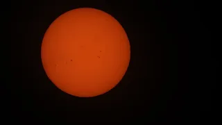 Sun with satellites crossing