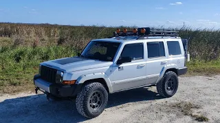 LIFTED JEEP COMMANDER ON 33" TIRES!!