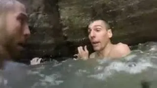 Two guys jump behind a waterfall    one panics