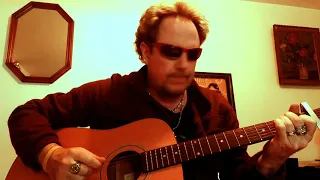 Elle est d'ailleurs... ( Pierre Bachelet) cover guitare et voix.