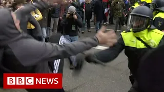 At least 30 arrested during Amsterdam unauthorised lockdown and vaccination protest - BBC News