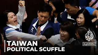 Taiwan reform dispute: Scuffles break out in parliament