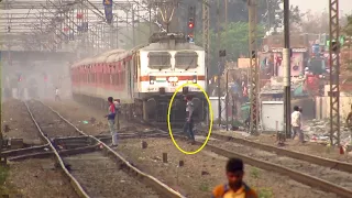 Stupid Ignorant Man Challenging The Speeding Mumbai Rajdhani Express | INDIAN RAILWAYS