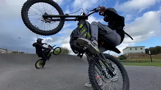 Sur Ron Pump Track, WHEELIES & Skate Park Riding *HE CAME OFF*