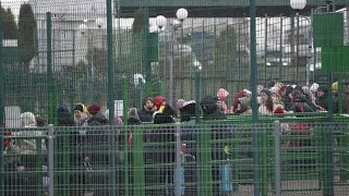 Separating families say goodbye at Kyiv's train station