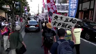 Protesters in Tokyo call for Olympics to be canceled