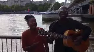 Watch Seal sing Kiss From A Rose in a London street with busker Sherika, 2016