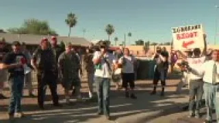 Protesters gathered outside a Phoenix mosque on Friday as police kept the two groups sparring about