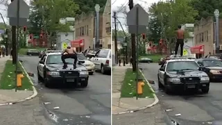 2 New Jersey officers suspended for doing 'nothing' as man jumps, stomps on police car