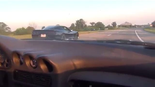 3000gt 4g64 sohc vs c5 vett roll race.