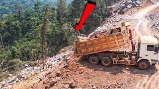 Astonishing Activities Construction of Risky Mountain Road with 10Wheel  Truck Unloading Big Rock