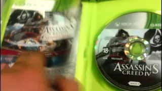 Распаковка игры assassins creed 4 black flag и assassins creed rogue для XBOX 360