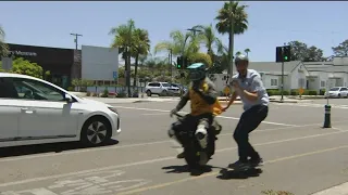 Look mom, no hands!! Valley Center man beats high gas prices with electric unicycle