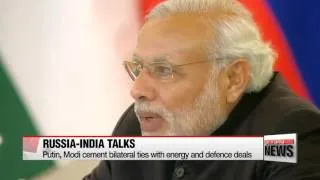 Russia， India ink energy and defense deals